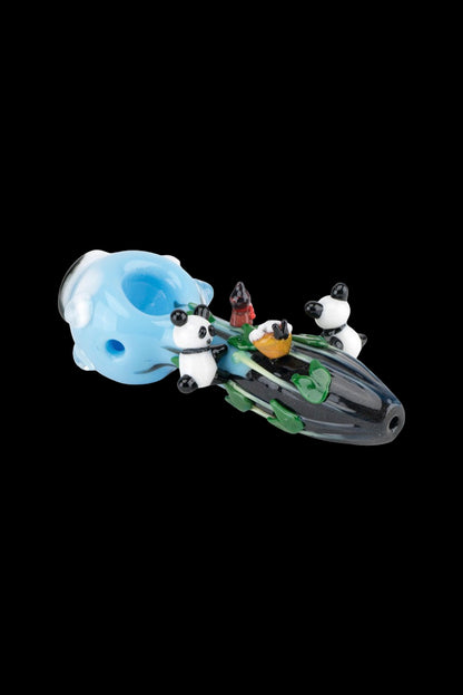 Hand-blown glass cannabis pipe shaped like a spaceship with panda figurines.