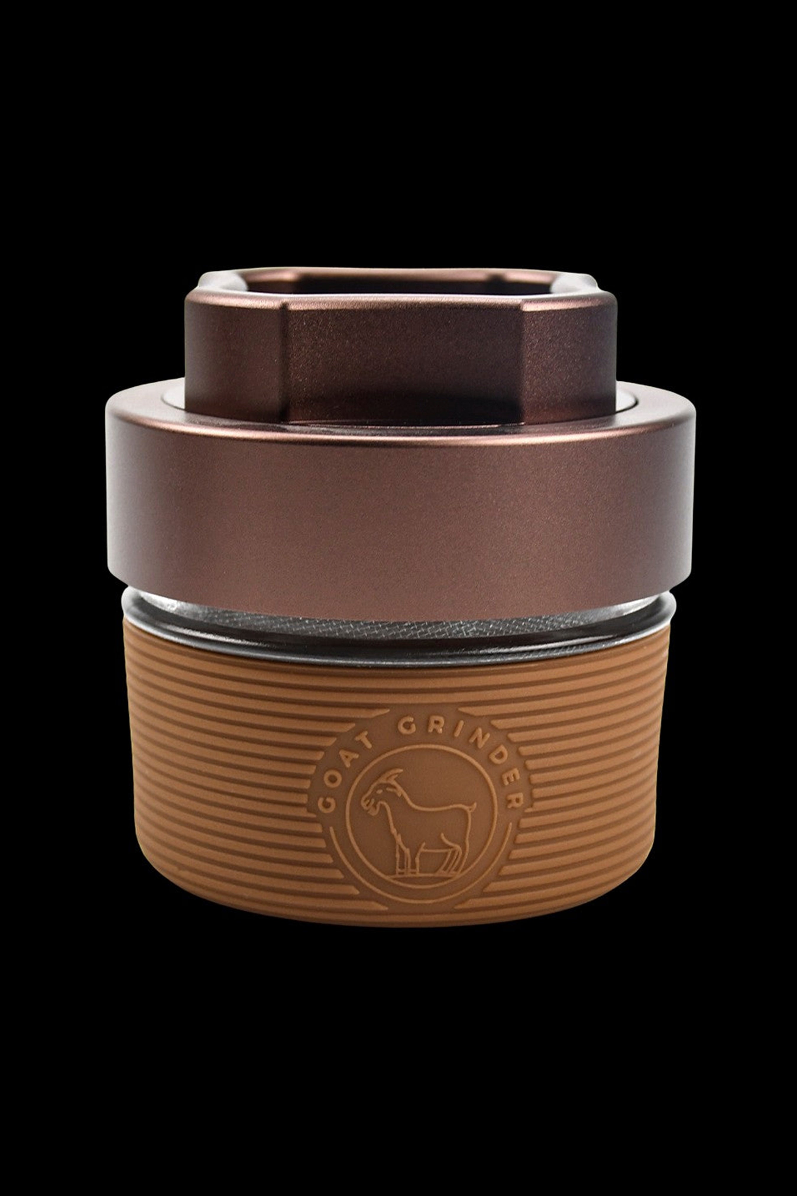 Copper cannabis grinder with a goat logo, featuring ribbed texture and a sealed storage base.
