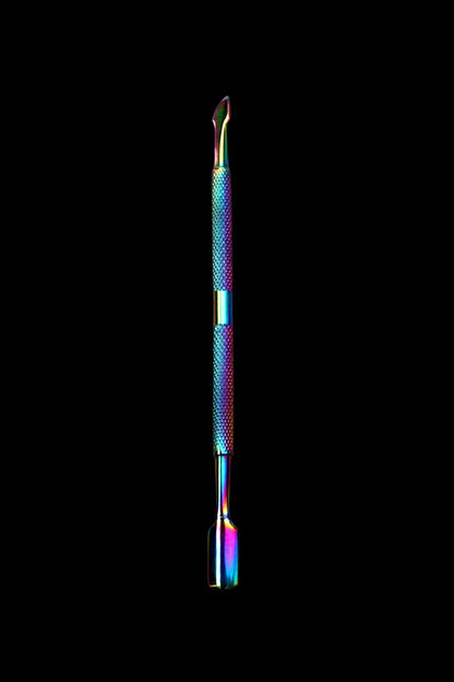 Centered, close-up view of The Stash Shack Stainless Steel Dual Dabber Tool showing its rainbow-steel finish, textured midsection, and two distinct tips against a black background