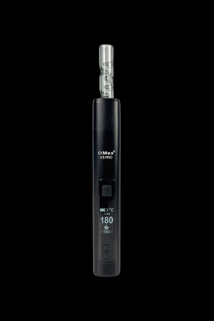 Black XMAX V3 Pro cannabis vaporizer with glass mouthpiece, displaying a temperature of 180°C on the digital screen. 