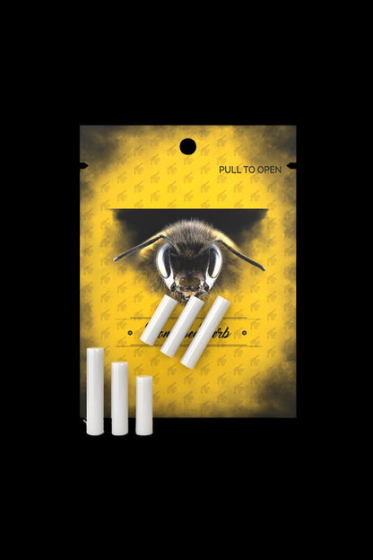 Yellow packaging for cannabis filter tips featuring a bee illustration and text reading "Pull to Open".