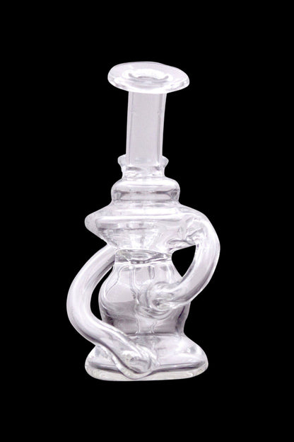 Clear glass dab rig with intricate sculptural design.