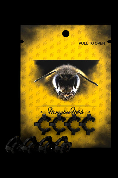 Close-up front view of a large Honeybee Herb Keck Clip package showing a bee face graphic on yellow backing with rows of black clips.
