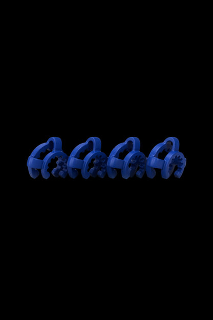 Row of four low-angle blue Honeybee Herb Keck Clip pieces photographed against a deep black background showing their curved grips.