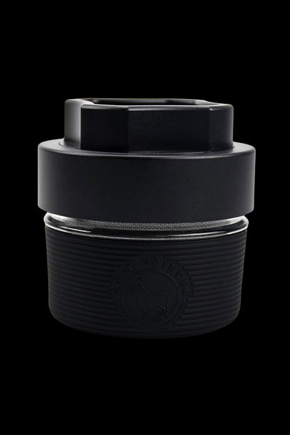 Black silicone cannabis concentrate container with embossed logo.