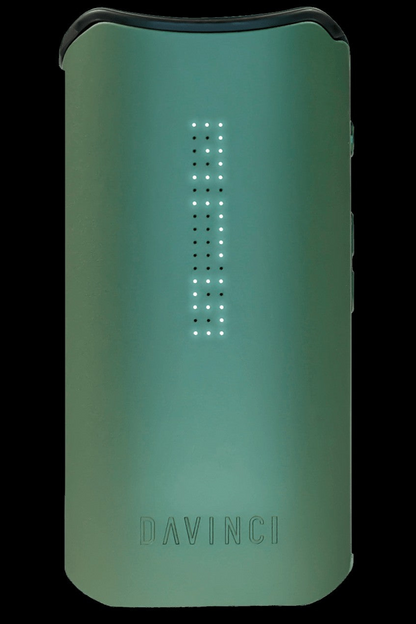 Teal DaVinci IQ2 cannabis vaporizer with illuminated indicator lights.