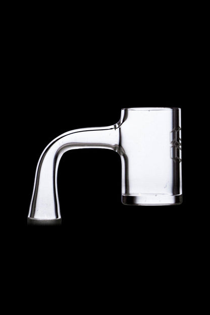 Clear quartz dab rig insert on black background.