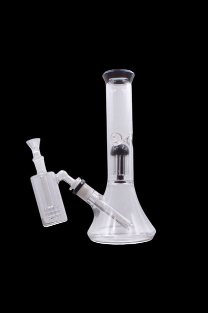 Glass bong with bubbler and downstem, isolated on black.