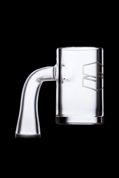 Clear quartz dab rig with a geometric logo.