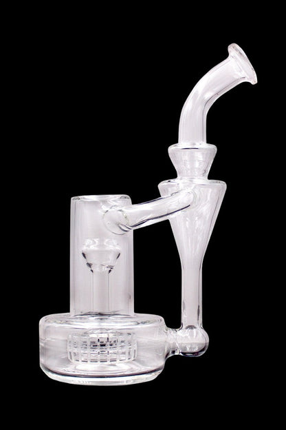 Clear glass water pipe (rig) with intricate percolator base and curved mouthpiece, isolated on black.