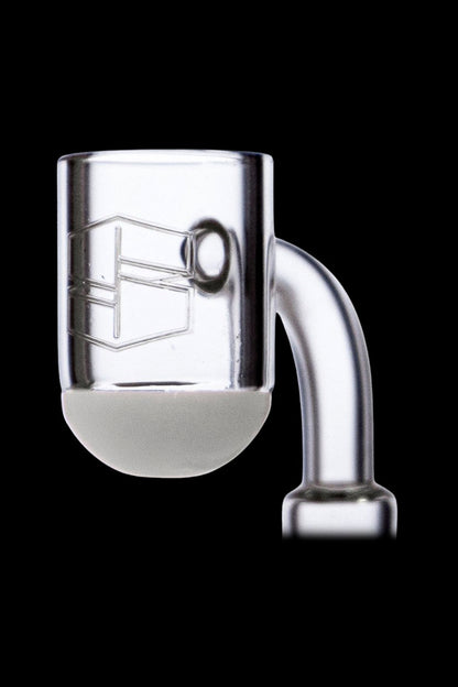 Clear glass dab rig insert with etched design.