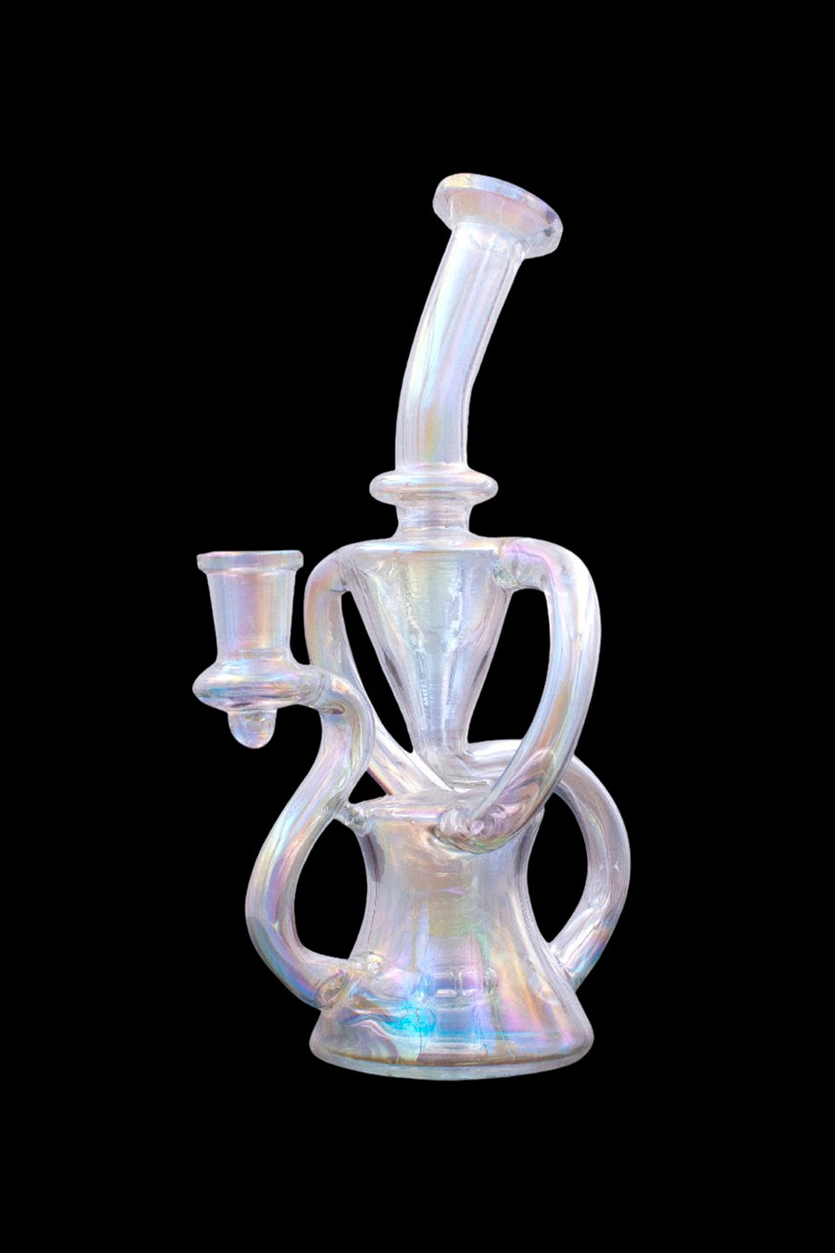 Iridescent glass water pipe (rig) with intricate looped design, isolated on black.