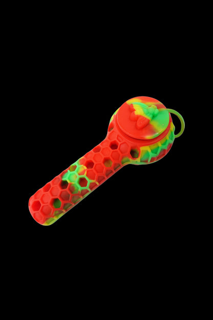 Red and green silicone pipe with honeycomb texture.