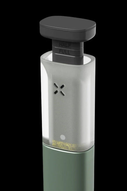 Pale green cannabis vaporizer with a dark green base.