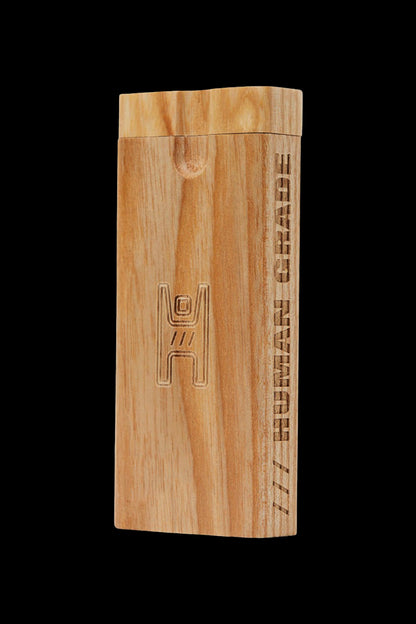 Wooden dugout with engraved branding, isolated on a black background."