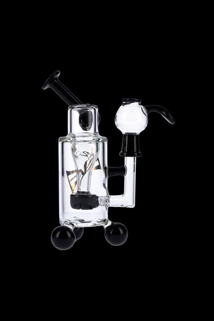 Clear glass rig with bubbler and mouthpiece, isolated on a black background.