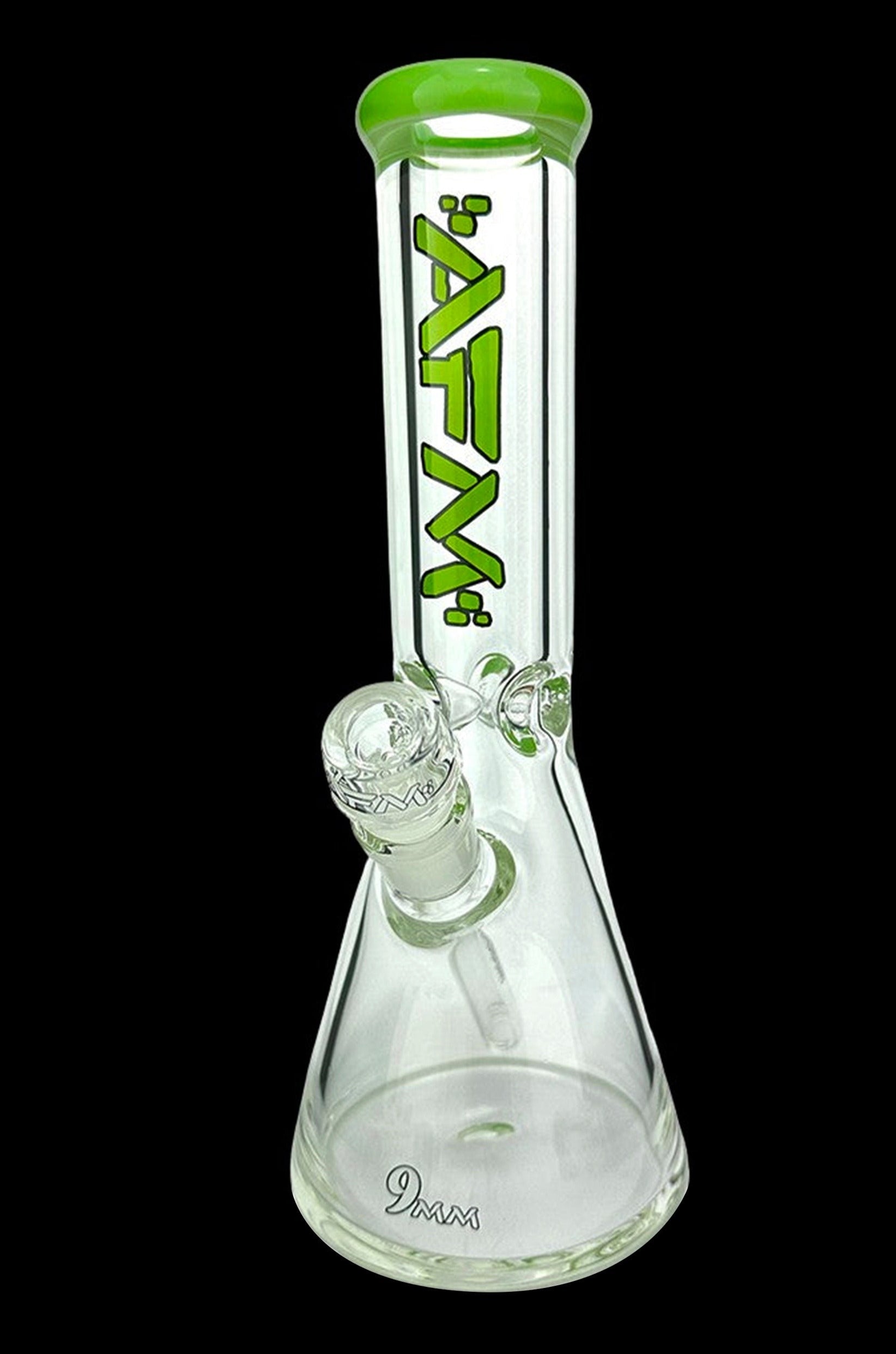 Clear glass beaker bong with green accents and a glass bowl.