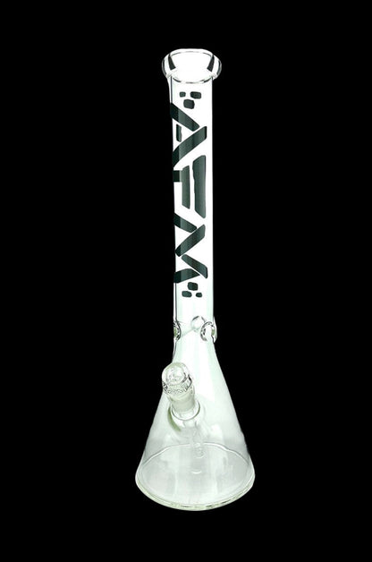 Clear glass bong with black graphic design, isolated on a black background.
