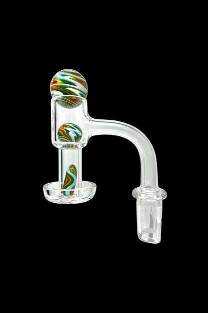 Glass cannabis oil rig attachment with colorful swirls.