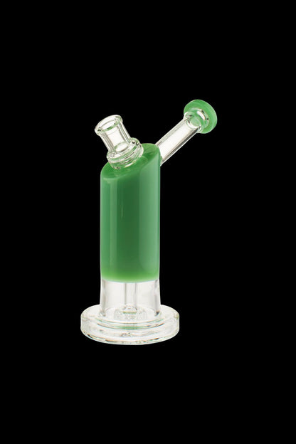 Green glass rig with spherical mouthpiece, isolated on a black background.