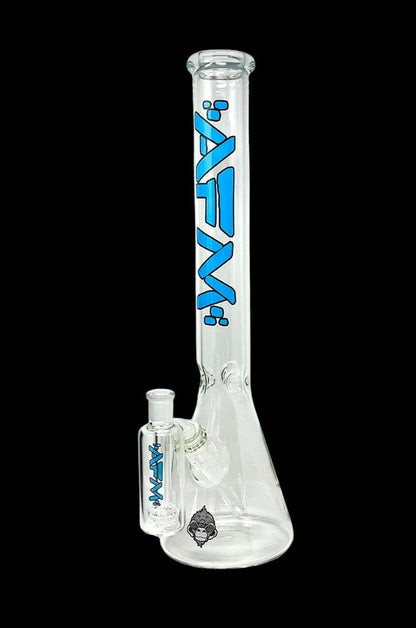 Clear glass bong with blue lettering and a small glass attachment, isolated on a black background.