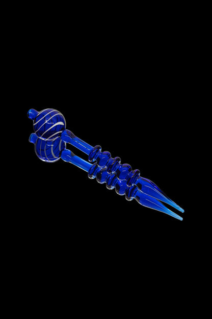 Blue glass dab tool with spiral design.