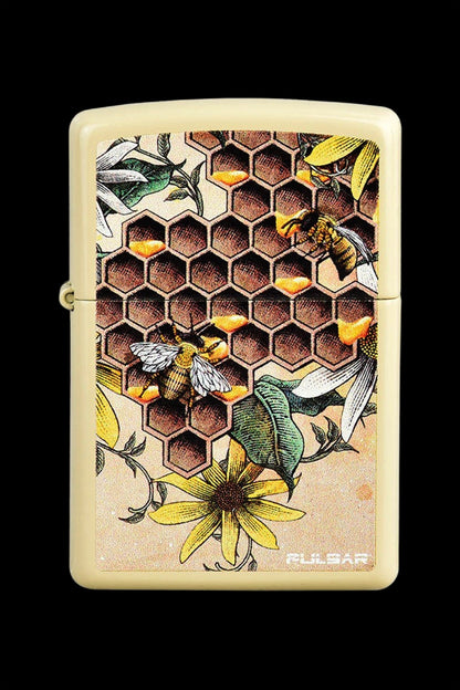 Gold lighter decorated with a honeycomb pattern, bees, and wildflower illustrations, branded "Pulsar."