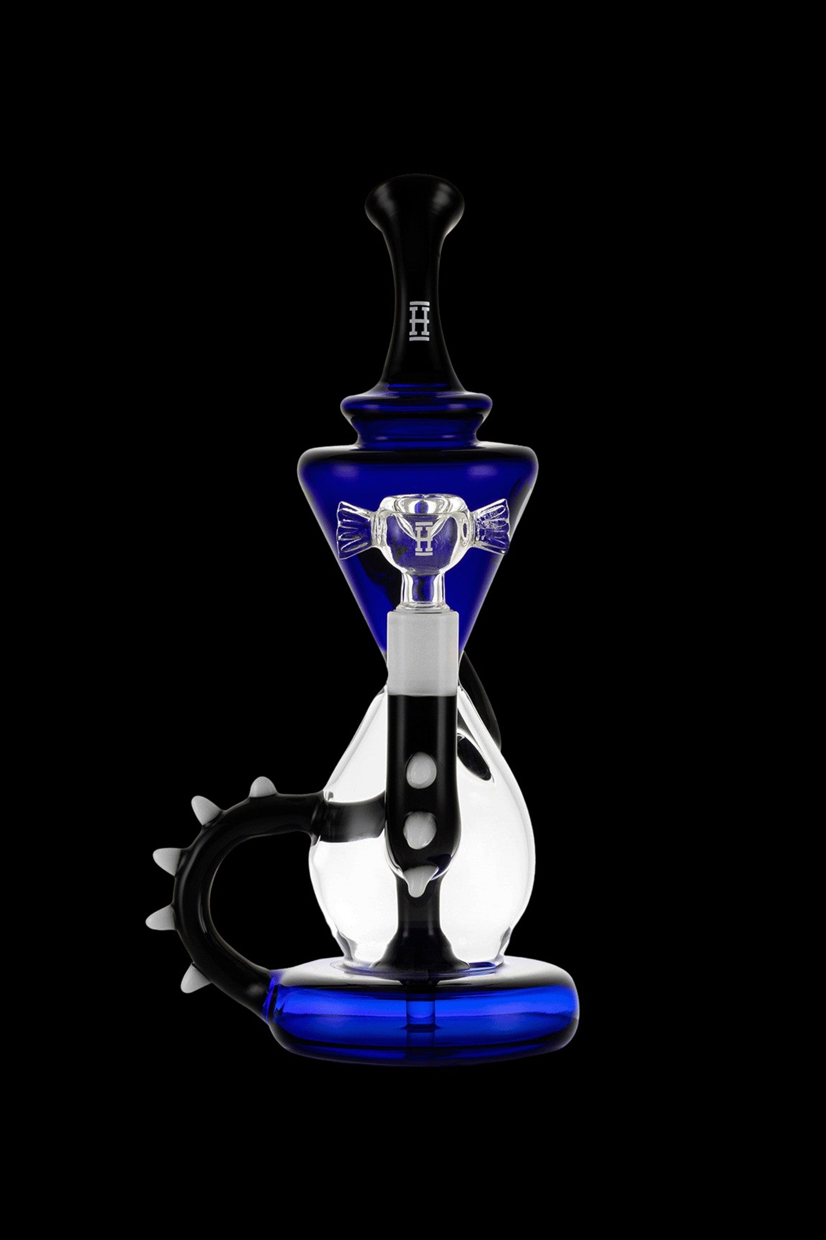 Blue and black glass water pipe (rig) with intricate design and curved mouthpiece, isolated on a black background.