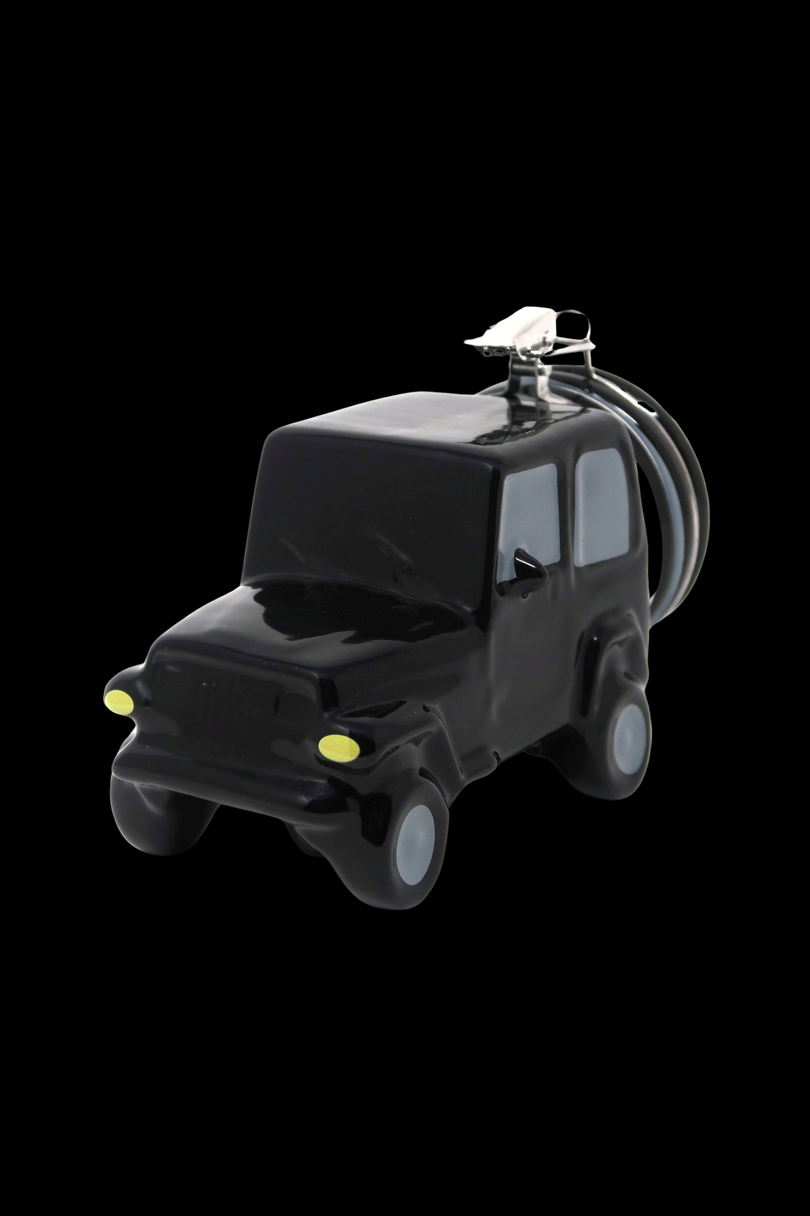 Black glass water pipe shaped like a Jeep with illuminated bowl.