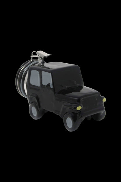 Black cannabis pipe shaped like a vintage jeep with a silver luggage rack.