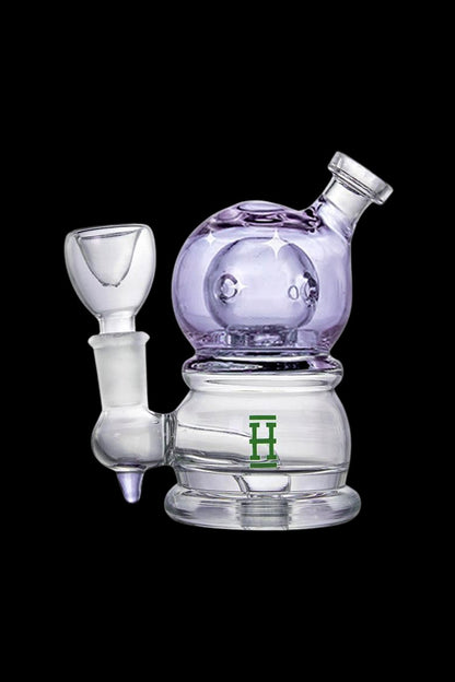 Lavender glass rig with a green logo and accompanying glass bowl.