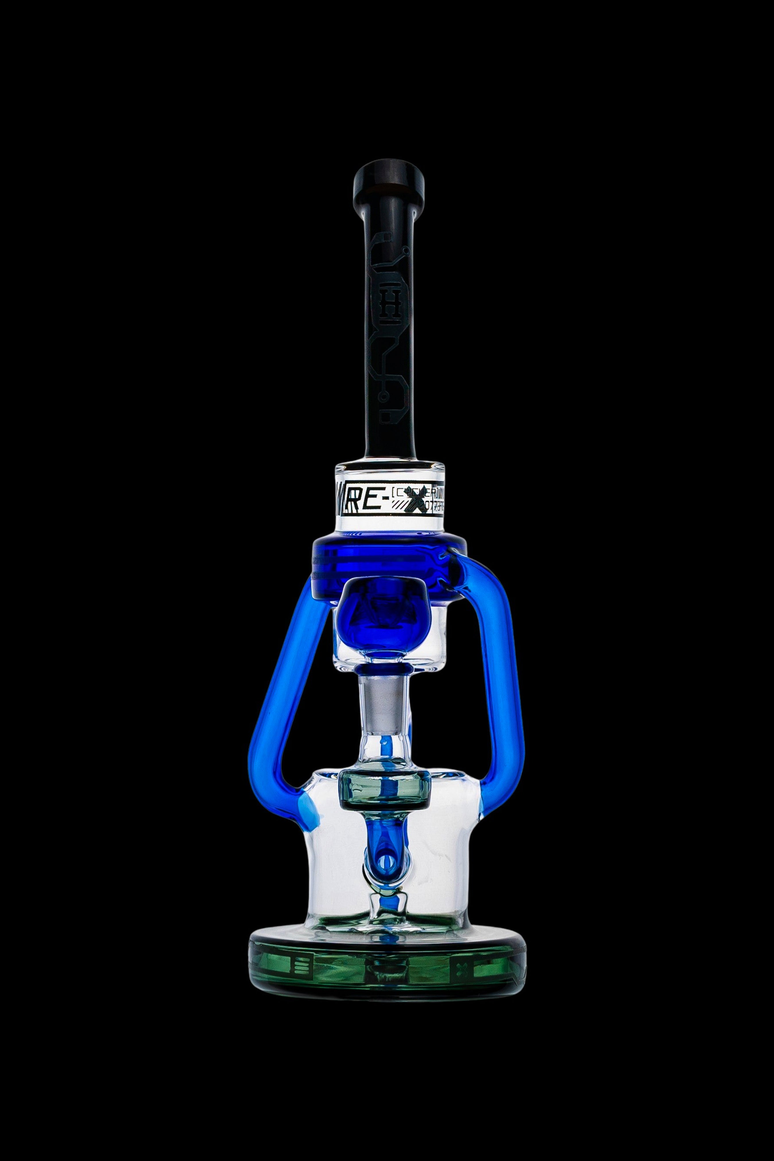 Blue and clear glass dab rig with intricate design against a black background.