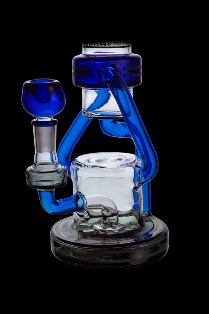 Blue glass water pipe (rig) with intricate curves and a clear glass bowl.