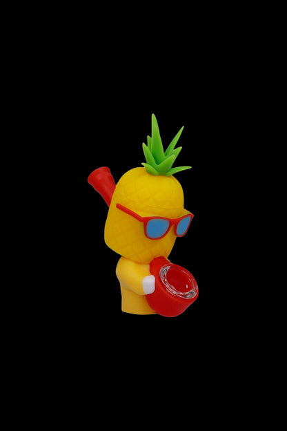 Yellow cartoon pineapple-shaped water pipe with red sunglasses and a detachable glass bowl.