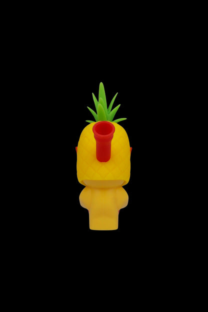 Yellow pineapple-shaped water pipe with a red mouthpiece and green leaves.