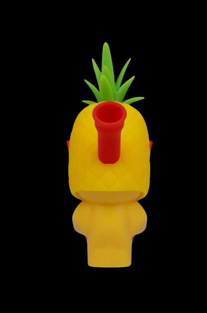 Yellow pineapple-shaped water pipe with a red mouthpiece and green leafy top.
