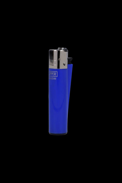 Blue Clipper lighter isolated on a black background.