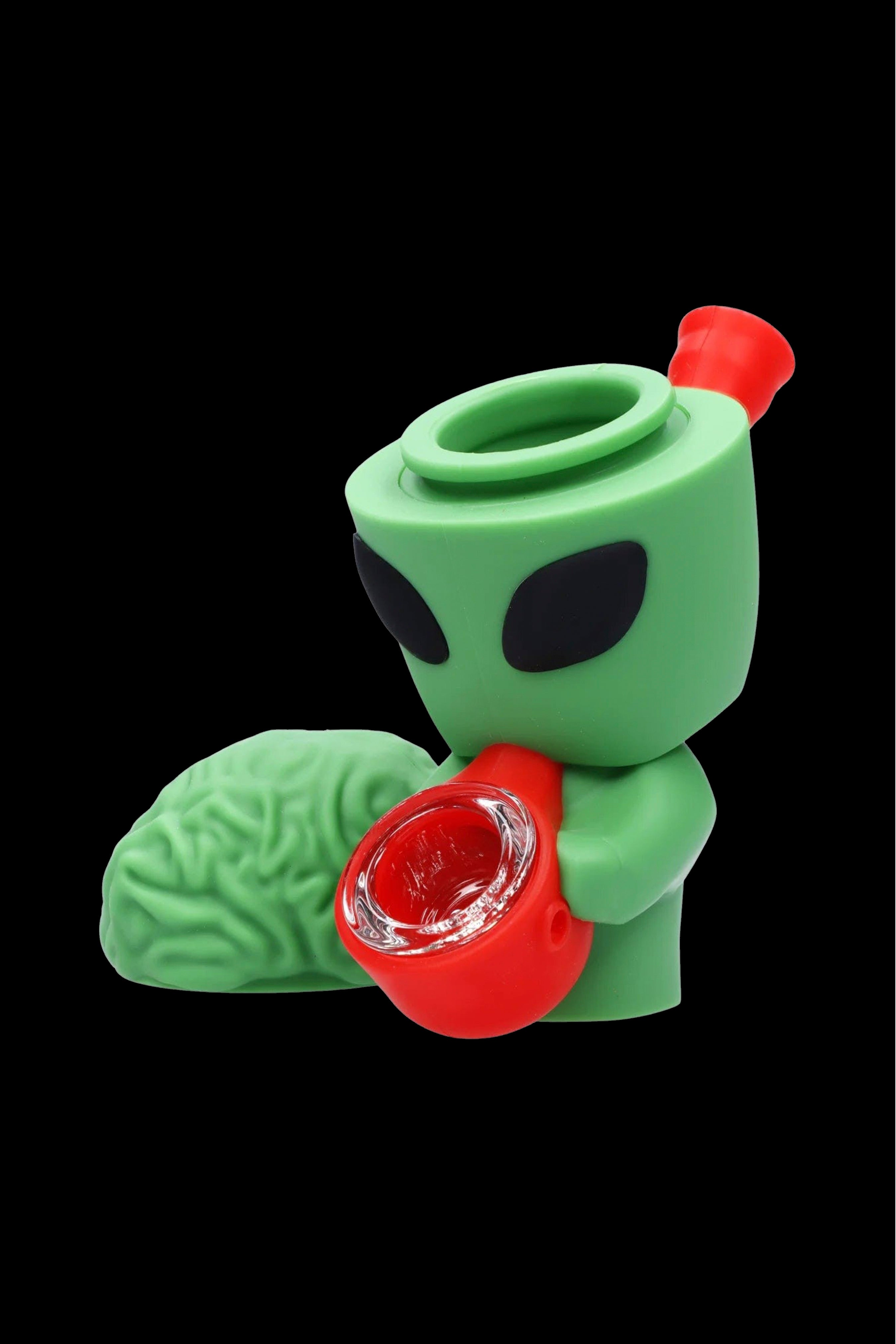 Green alien-shaped silicone bubbler with a red mouthpiece and brain-shaped ash catcher.