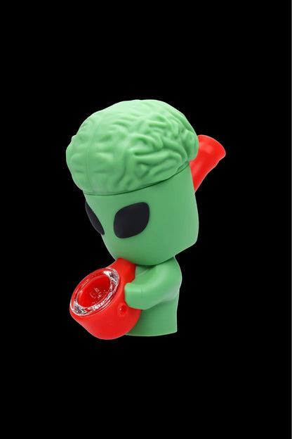 Green alien-shaped silicone water pipe with a red mouthpiece.