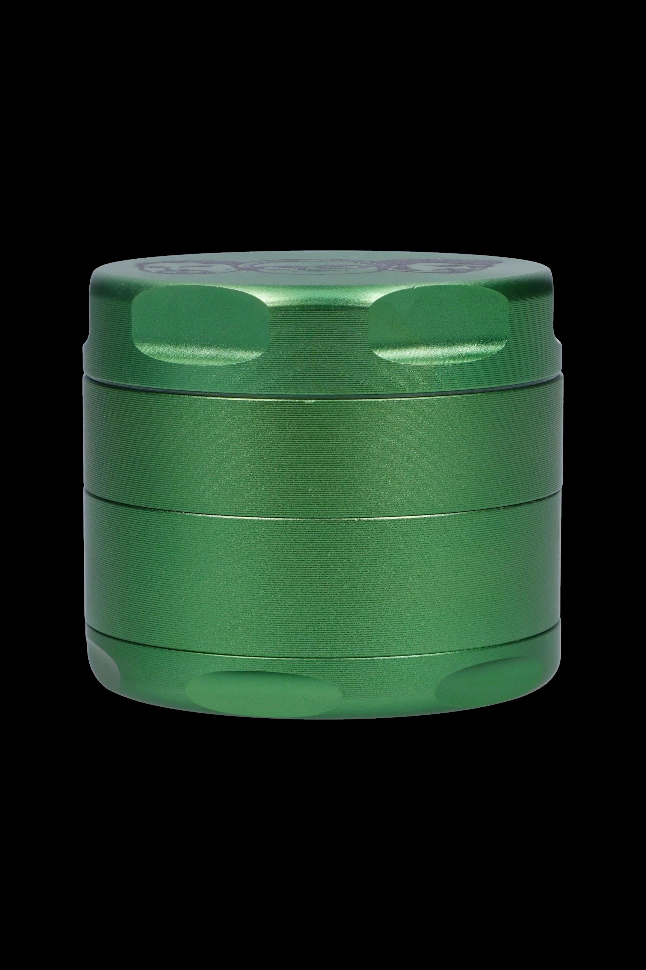 Green four-layer metal grinder for cannabis.