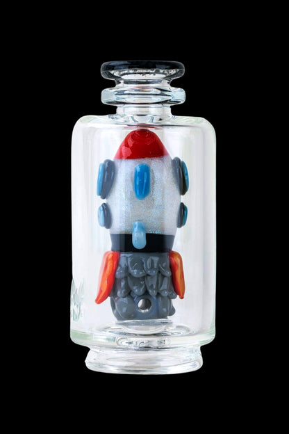 Hand-blown glass water pipe shaped like a colorful rocket ship.