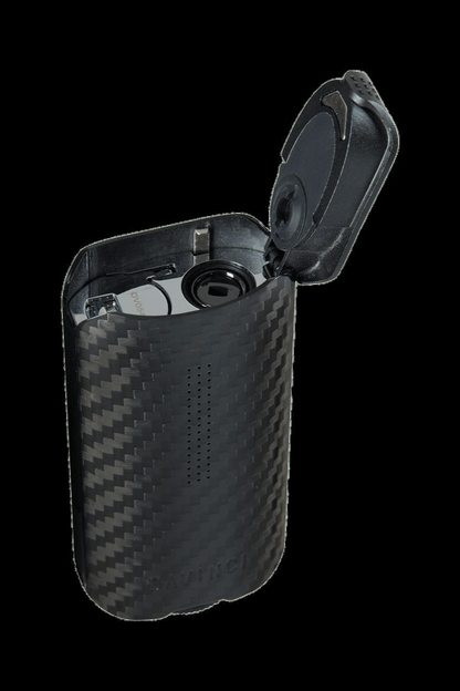 Black textured cannabis vaporizer with open lid.