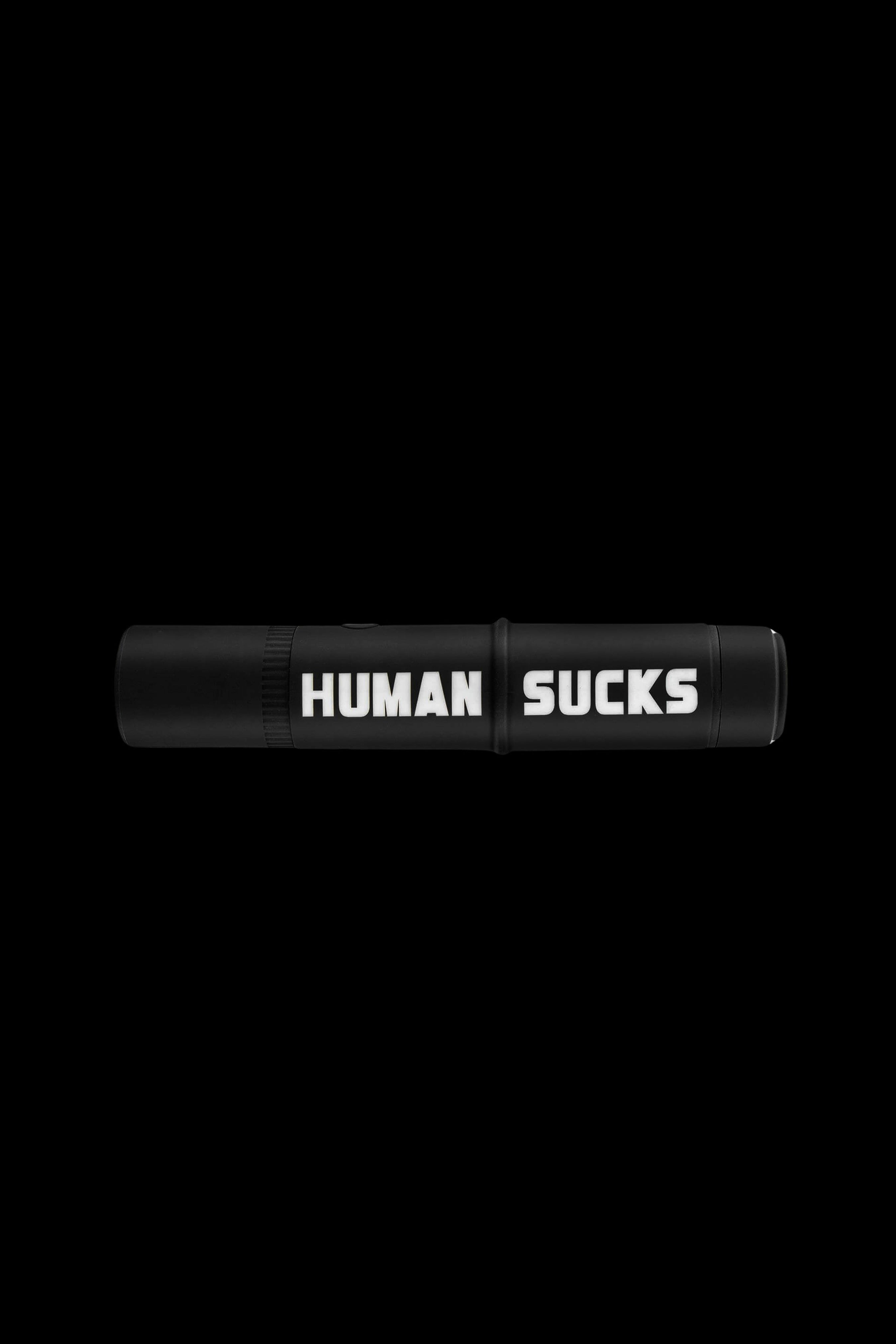 Black cannabis vape pen with “HUMAN SUCKS” text in white.