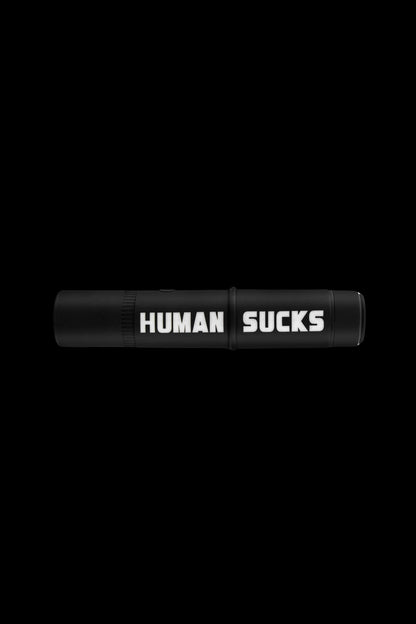 Black cannabis vape pen with “HUMAN SUCKS” text in white.