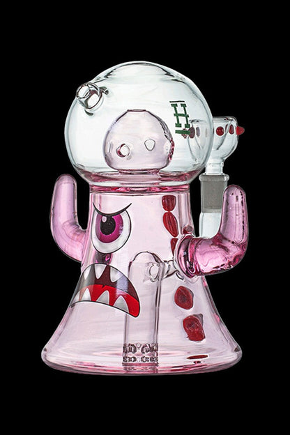 Glass water pipe shaped like a cartoon monster with a wide-open mouth and googly eyes.