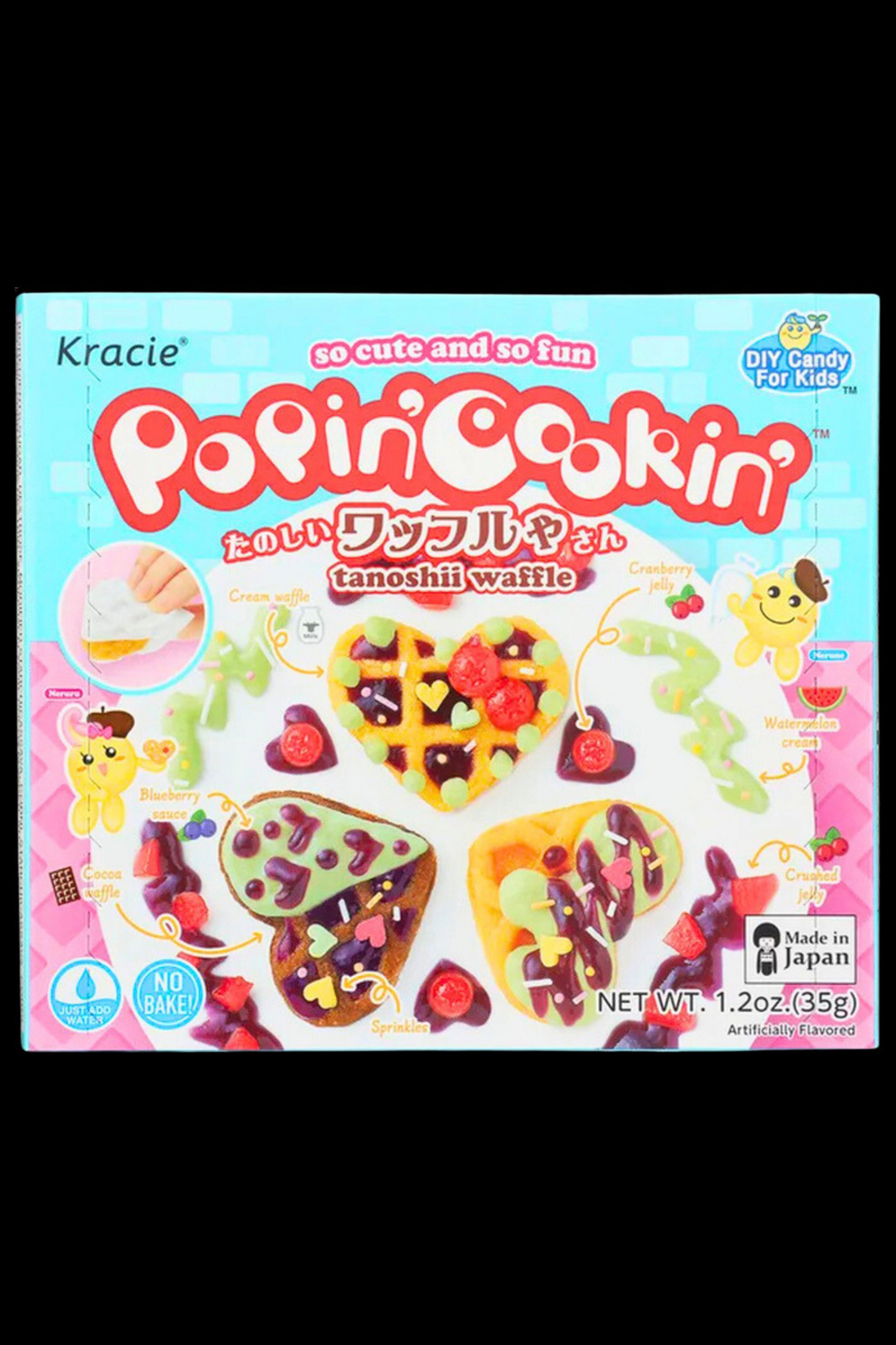 A colorful box of "Popin' Cookin'" Tanoshii Waffle DIY candy kit, potentially used for concealing or displaying cannabis accessories.