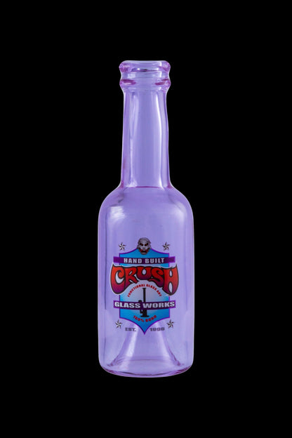 Purple glass bottle with "Crash Glass Works" label, likely for cannabis concentrates.