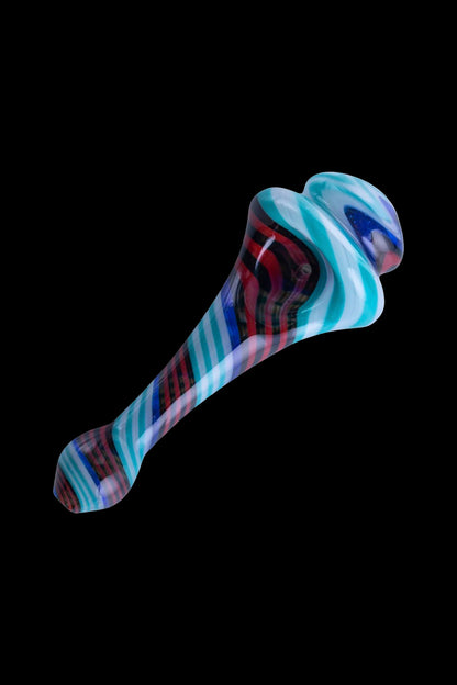 Hand-blown glass pipe with colorful swirl patterns, isolated on black.