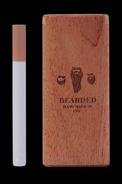 Wooden dugout with a pre-rolled joint beside it, branded with a beard illustration and "Bearded" text.