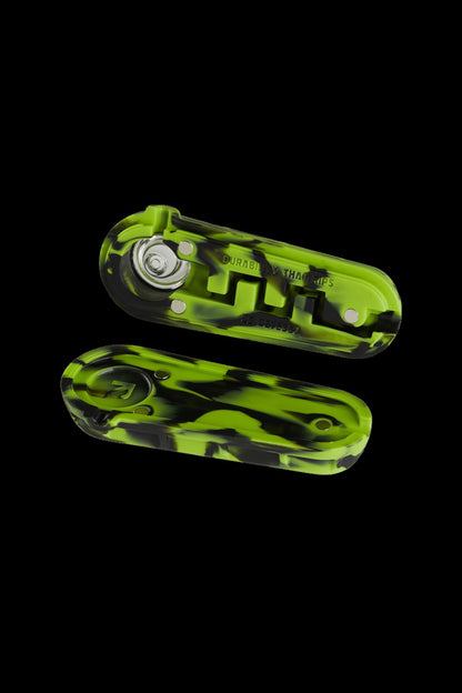 Green and white marbled cannabis vape cartridge with magnetic connection.